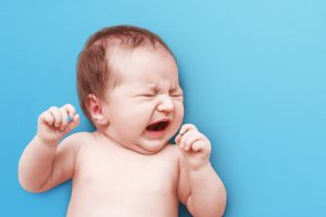 Bebê chorando ilustrando o artigo "Dor de dente em bebê"
